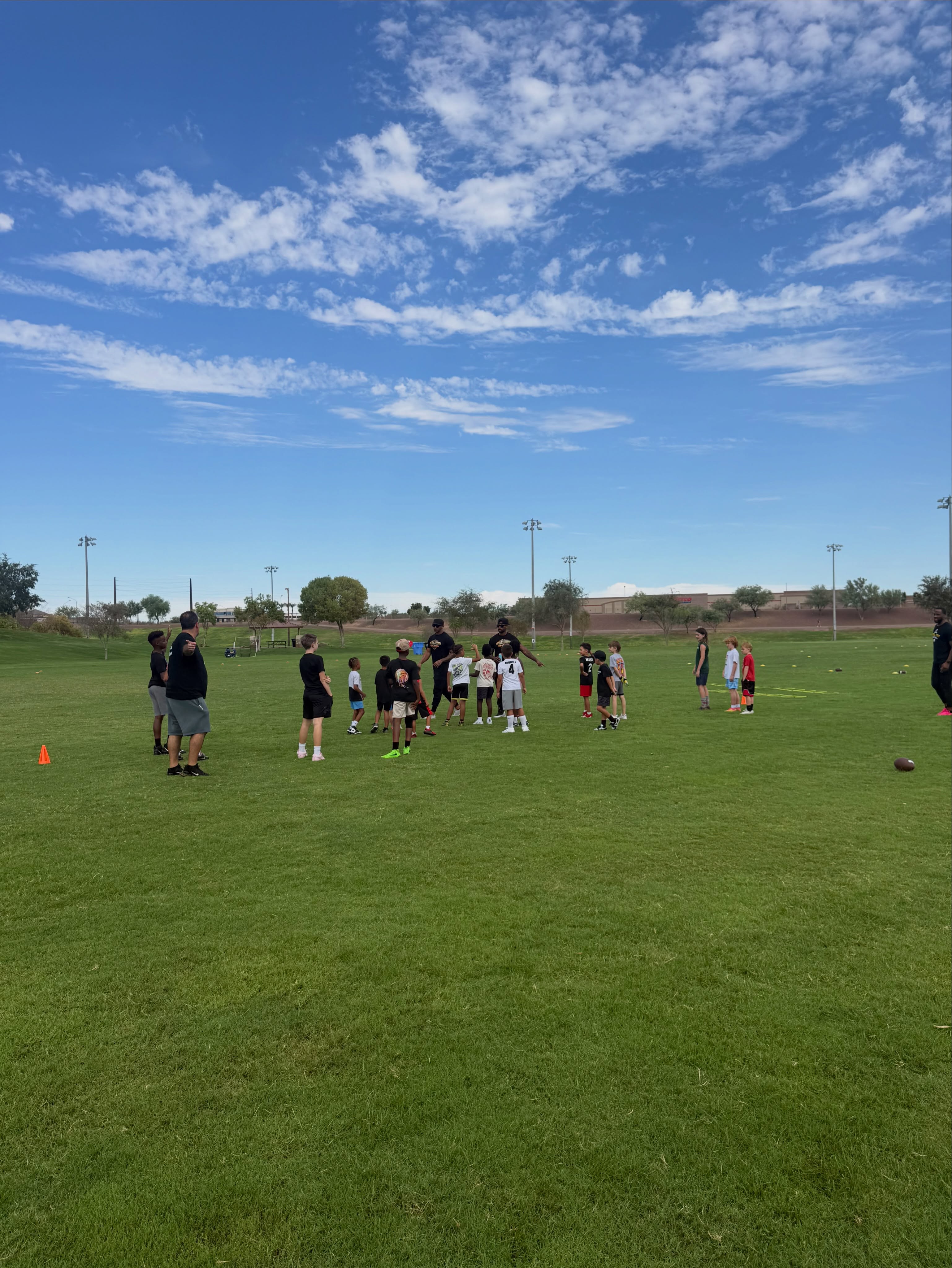 Athletes line up for a group training drill.